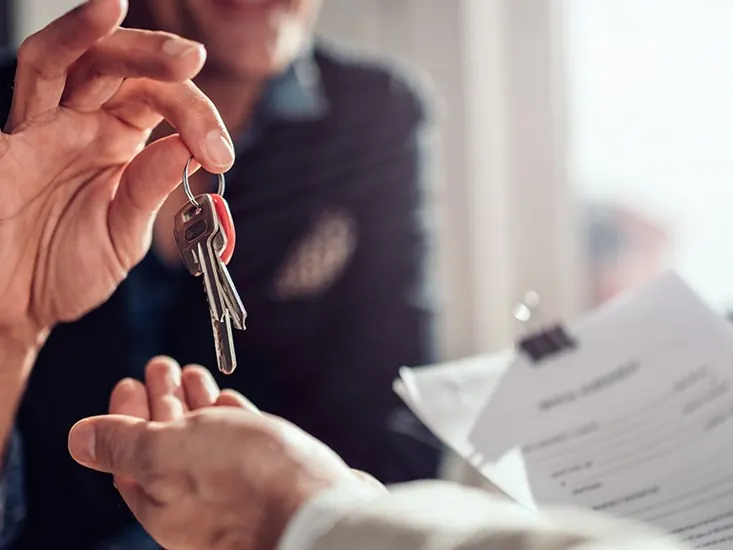 Keys handed over after selling a tenanted house in Ontario